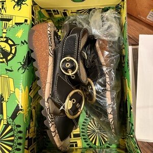 Black leather gold buckle sandals